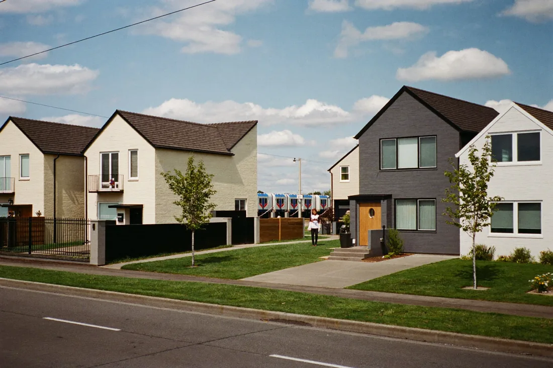 A quiet street of newer family homes in an outer Melbourne suburb, the kind of area first home buyers target for value.