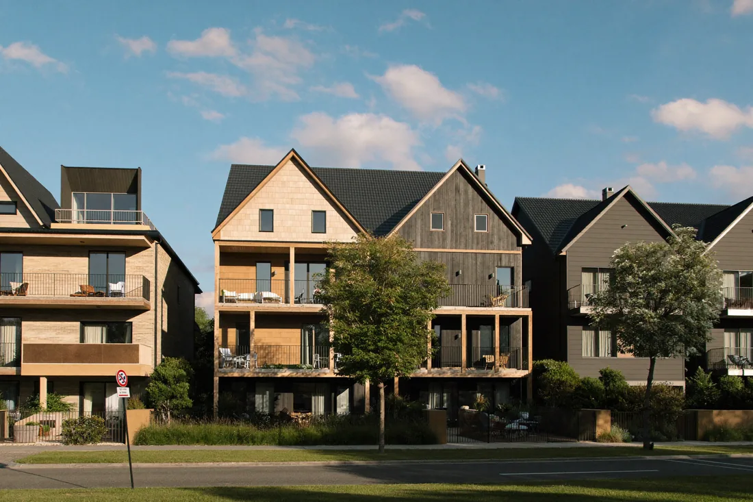 A row of modern Australian apartments and townhouses, the kind of higher-yielding unit stock that typically out-yields freestanding houses.