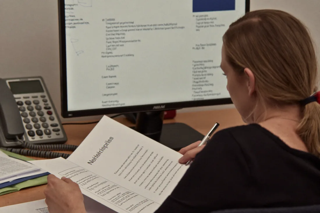 A conveyancer managing an electronic property settlement on settlement day in Australia.