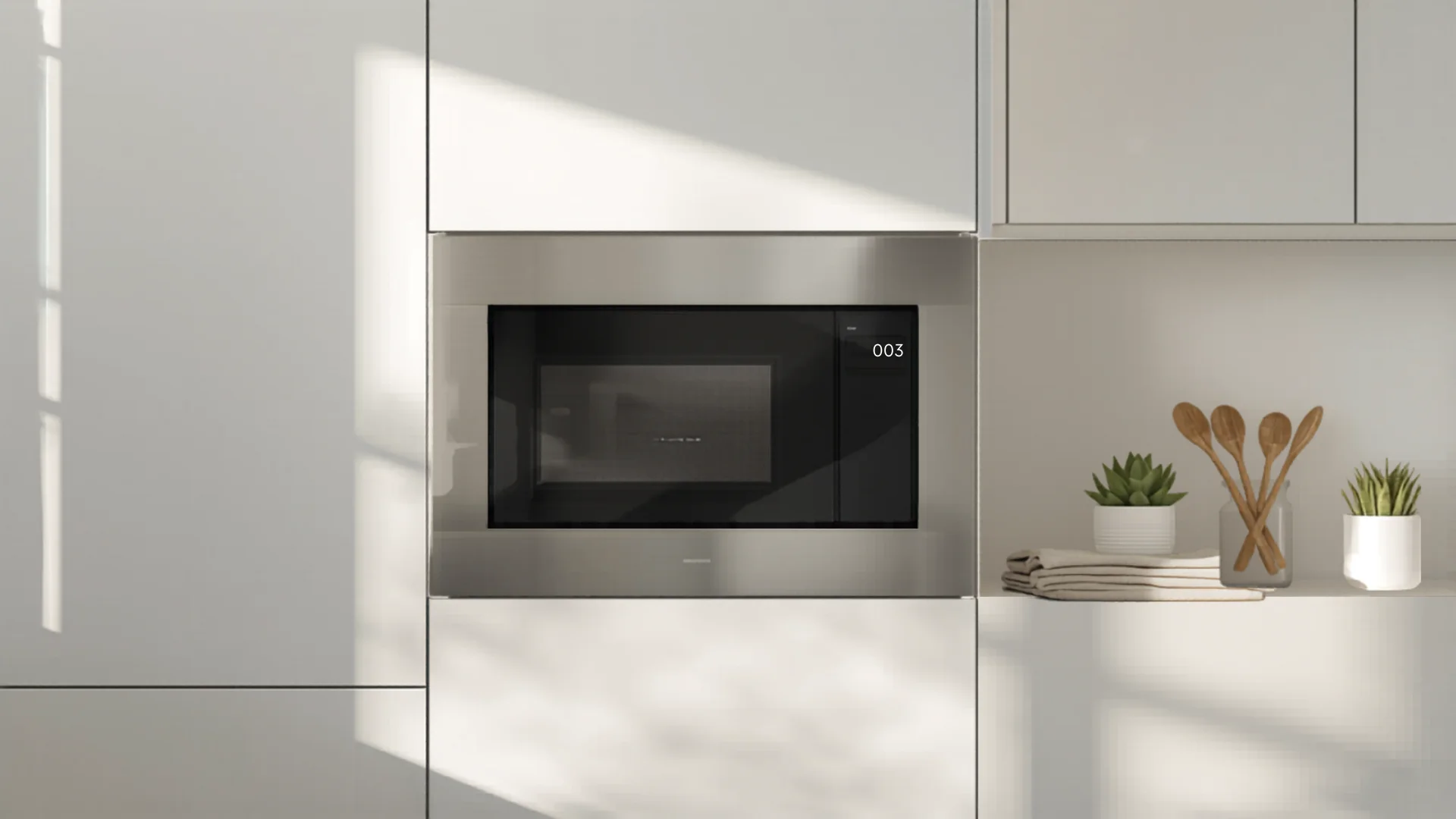 Modern Australian kitchen with built-in microwave and decorative accents