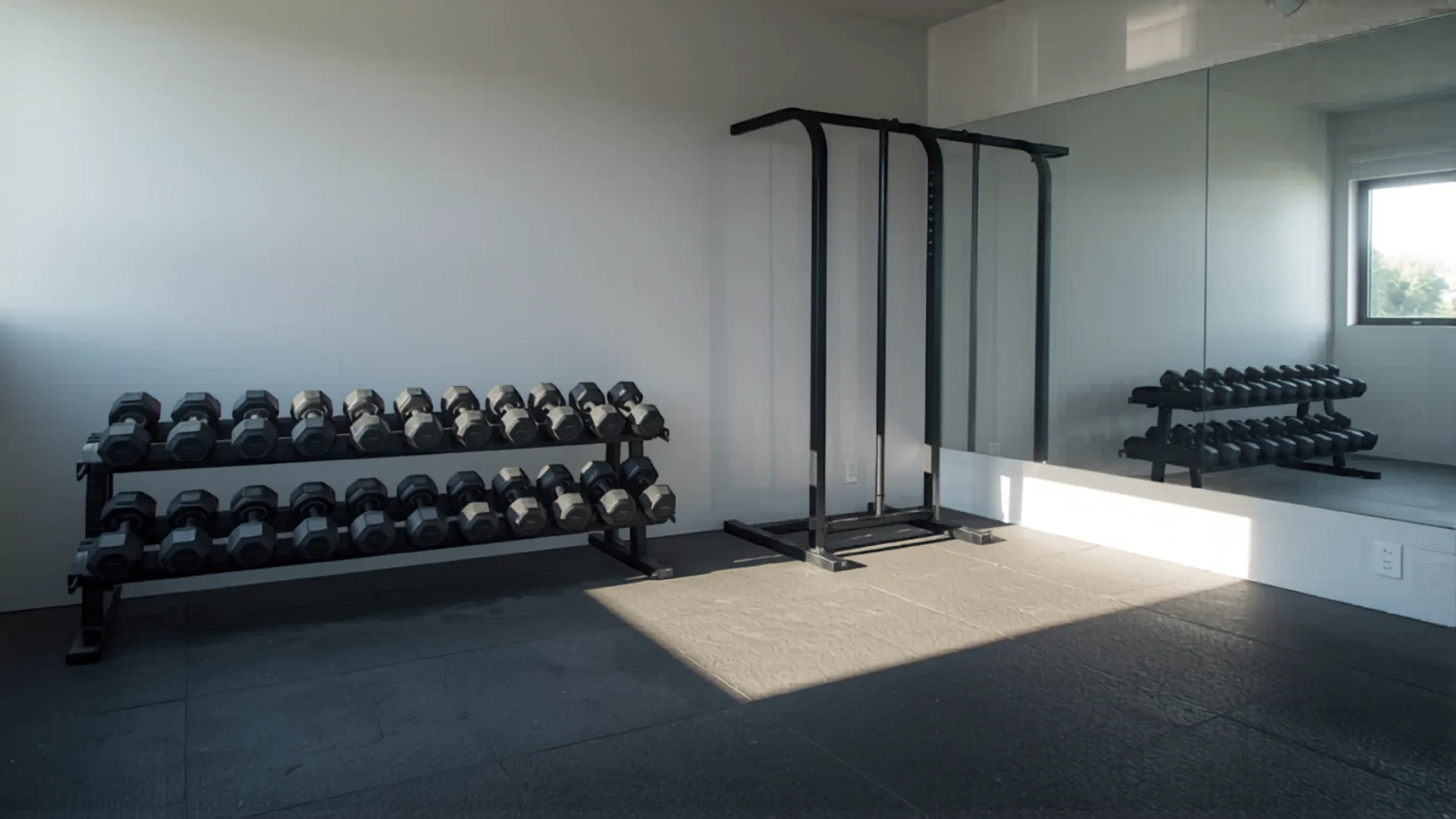 Modern home gym in Australian garage with rubber flooring and weights